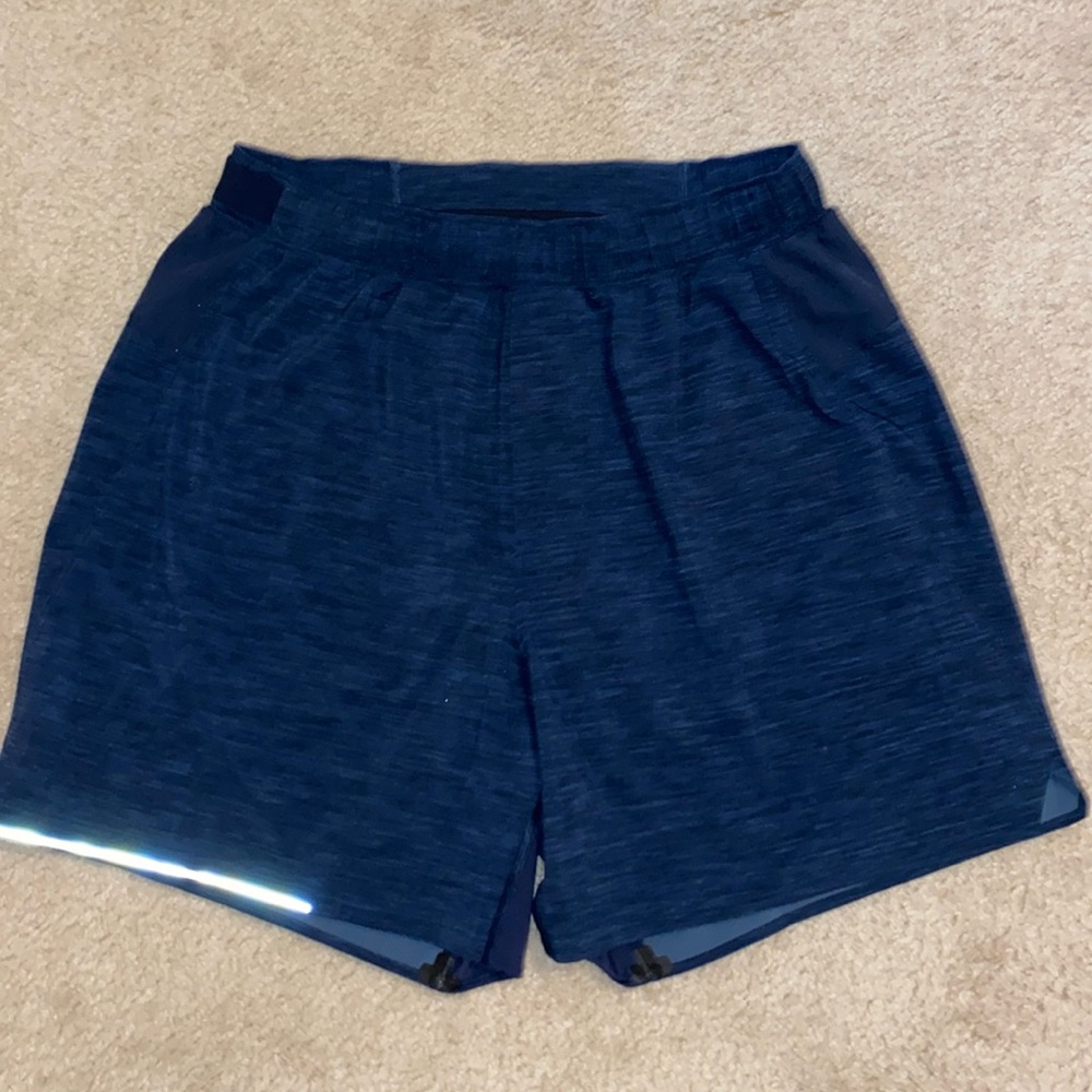 Lululemon men’s size medium lined shorts.